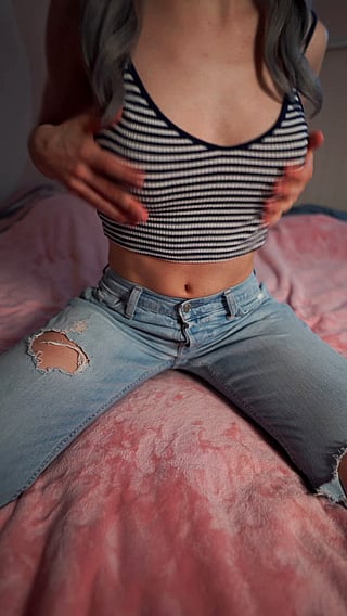 Busty Teen Shows Off Her Natural Tits'