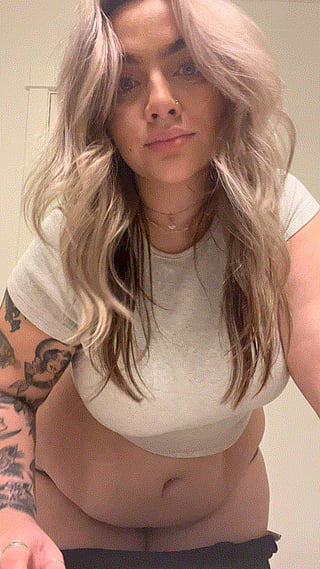 Huge Boob Reveal: A Busty Beauty Shows Off Her Assets'
