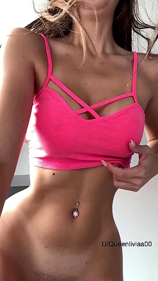 Juicy Bombshell: Pink Tank Top, Big Tits, and a Belly Button Ring'