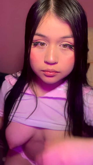 Can I put them on your face?: A Latina teen with a B cup shows off her OnlyFans cock on camera.'