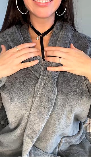 Busty Slut Reveals Her Boobs in This Sizzling Video'