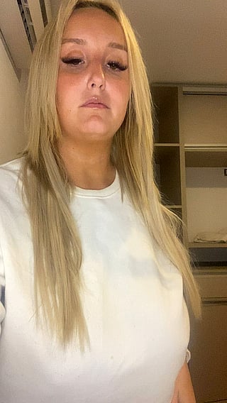 Boobs for Days: A White Shirt and Blonde Hair'