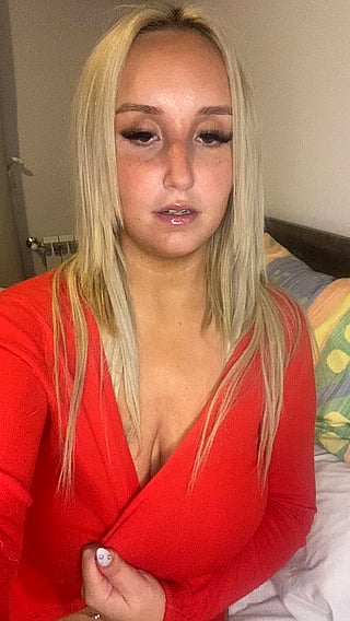 Busty Blonde Babe with DD Cups: Chest Out, Stress Gone!'