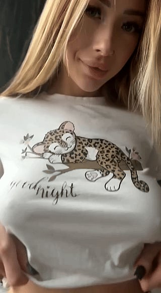 Showing off my boobs in a revealing shirt'