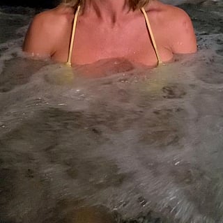 Hot Tub Fun with Big Tits: Anyone Want to Jump In?'