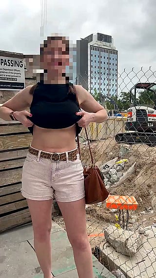 Busty Babe Shows Off Her Boobs for Construction Workers'