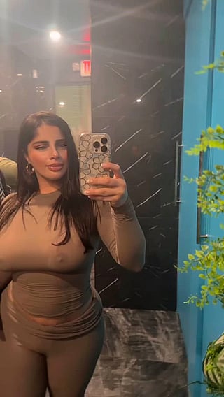 Busty Babe Takes a Selfie in a Club'