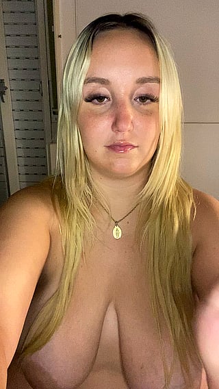Boobs for Days: A Blonde Babe with Big Boobs and Long Hair'