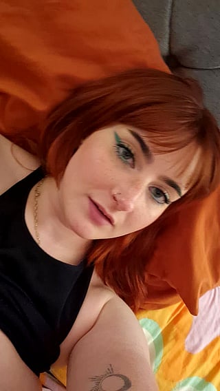 Redhead with Natural Tits Enjoys Nipple Licking'