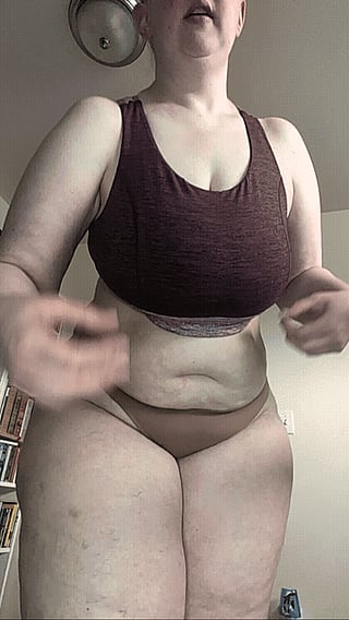 Would be better with your face between them - A video about a woman wearing a sports bra and underwear.'