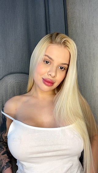 Blonde Babe Loves Getting Her Big Tits Out'