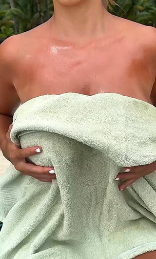 Wow, This Babe's Big Tits Are Amazing! Watch Her Reveal Them in This Sizzling Hot Video!'