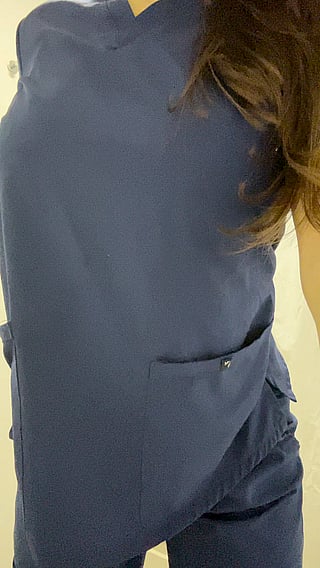 Naughty Nurse Reveals Her Perfect Tits'