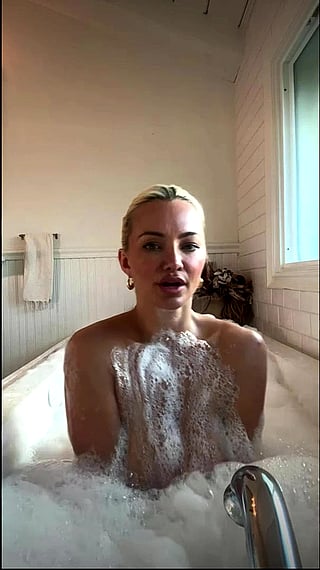 Reveal: Blonde Babe with Huge Tits in a Bathtub'
