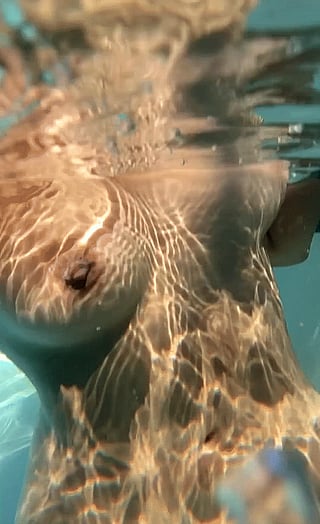 B Cup Babe Goes Swimming Without Bra or Underwear'