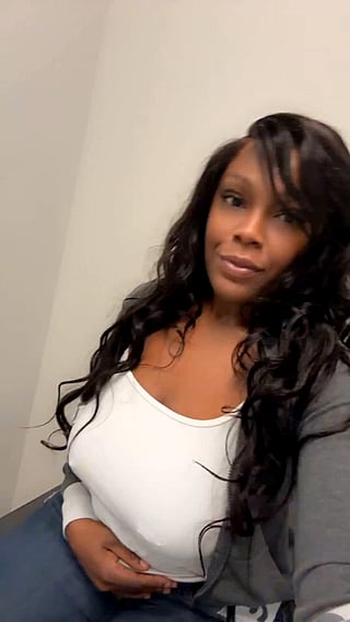 Busty Black Babe Shows Off Her Boobs'