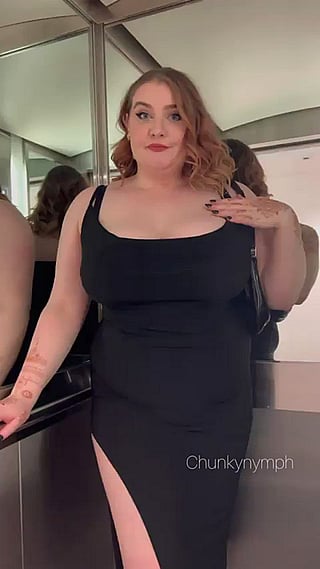 A Date Night Flash: A Curvy Woman in a Black Dress'