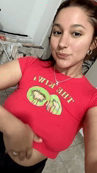 They Said They Look Delicious: A Woman in a Red Shirt Poses with Avocados'