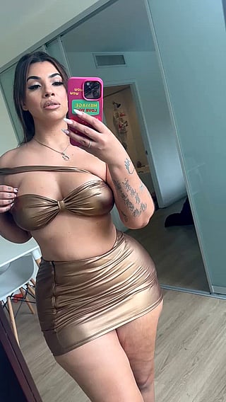 Big Tits Show Off in Gold Bikini'