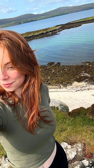 Redhead with Big Tits Poses on Beach for X Wing Factor'
