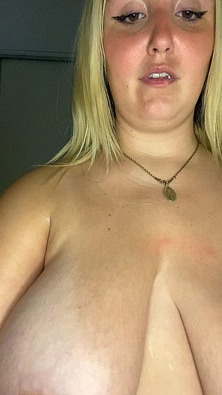 Blond Babe Flashes Her Boobs in Public'