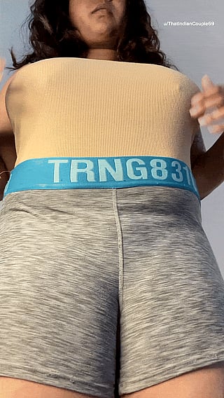 Watch the girl shake her booty in tight grey shorts.'