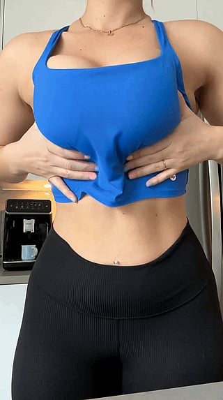 90s Mommy Still Looking Sexy with a Mombod - Black Leggings and Blue Tank Top'